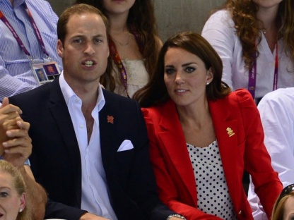 (L-R) Former British rower Steve Redgrave, Prince William, Duke of Cambridge, Catherine, Duchess of Cambridge and British Culture Secretary Jeremy Hunt react as they watch the women's 800m freestyle final during the swimming event at the London 2012 Olympic Games on August 3, 2012 in London.  AFP PHOTO / MARTIN BUREAU        (Photo credit should read MARTIN BUREAU/AFP/GettyImages)