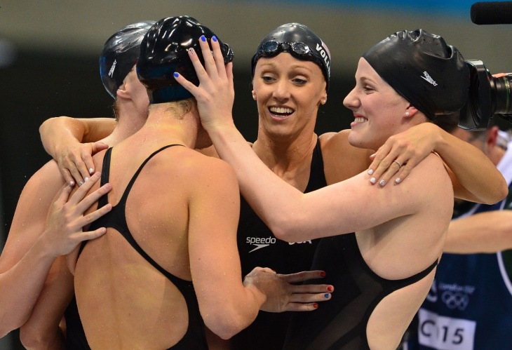 US swimmers Shannon Vreeland, Dana Vollmer, Allison Schmitt and Missy Franklin celebrate after the women's 4x200m freestyle relay final swimming event at the London 2012 Olympic Games on August 1, 2012 in London.         AFP PHOTO / GABRIEL BOUYSGABRIEL BOUYS/AFP/GettyImages